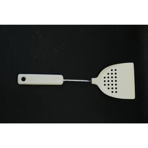 Vintage EKCO Cream Melamine Turner Spatula with a chrome-plated shank